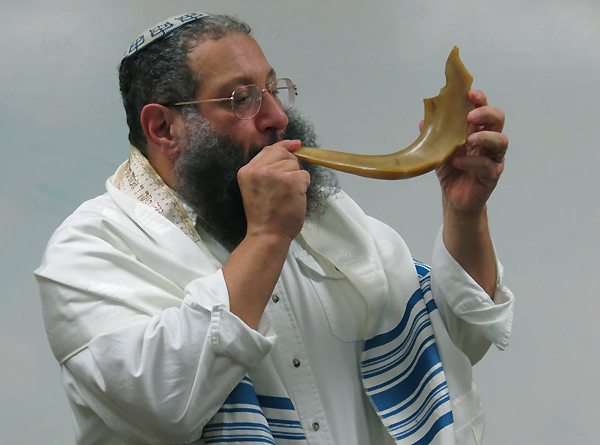 Mottel Baleston blows Shofar at the Ariel Messianic School